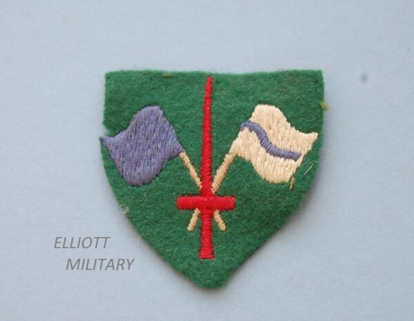 cloth badge showing flags and sword