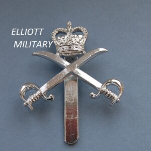 badge with crossed sabres below a crown