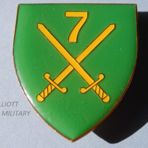 Badge with crossed swords and number 7 on shield