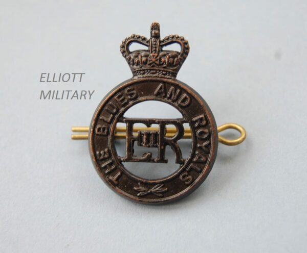 badge with E11R within a circle below a crown