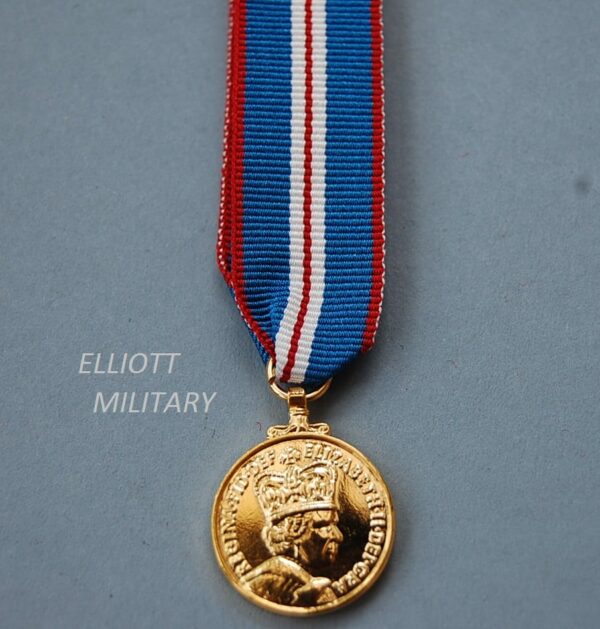 miniature medal with the queens head