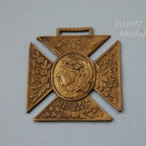 medal in shape of cross with head of Queen Victoria and the dates 1837 - 1897