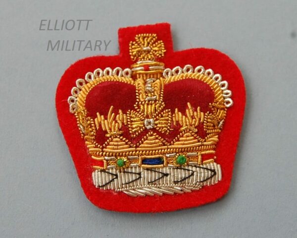 red backed padded cloth badge with wire embroidered crown