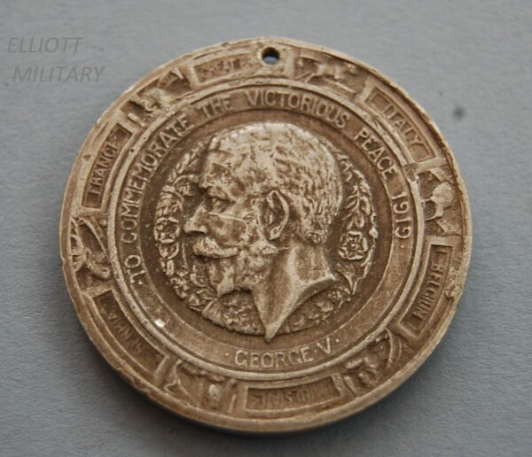 medal with side profile of King George V and the names of allied countries involved in WW1