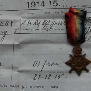 star shaped medal with crossed swords and 1914-15 dated scroll in the centre within a wreath below a crown