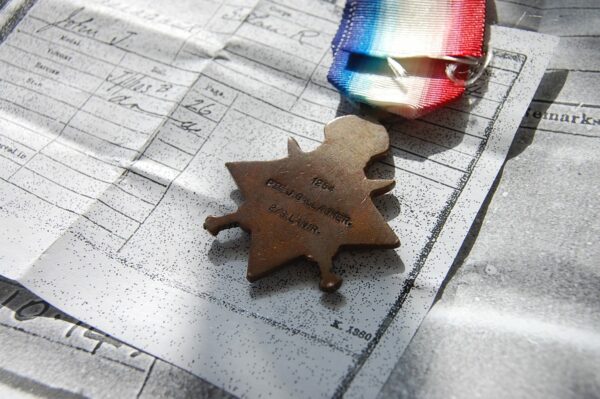 reverse of medal showing the naming details