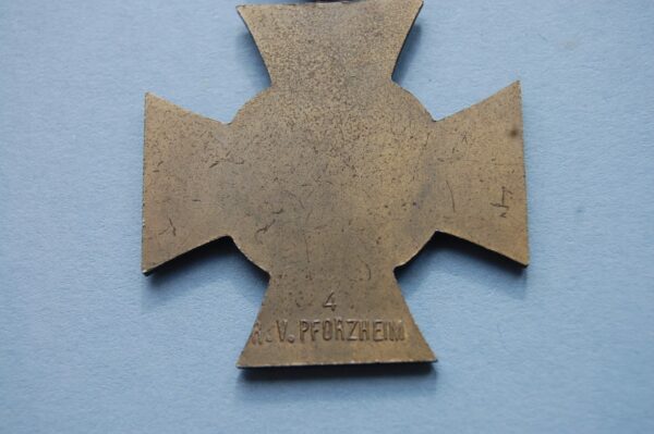 reverse of medal showing makers marks