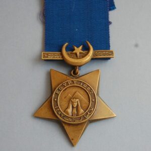 star shaped medal with sphynx and pyramid