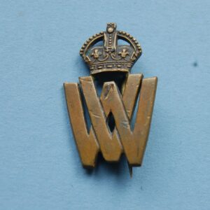 small badge with VW below a crown
