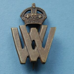 small badge with VW below a crown