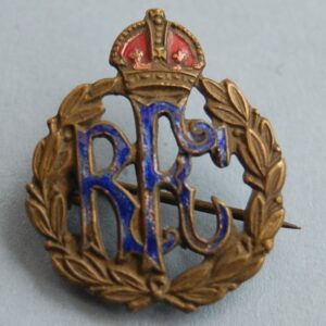 pin badge with letters RFC within a wreath below a crown with red and blue enamel