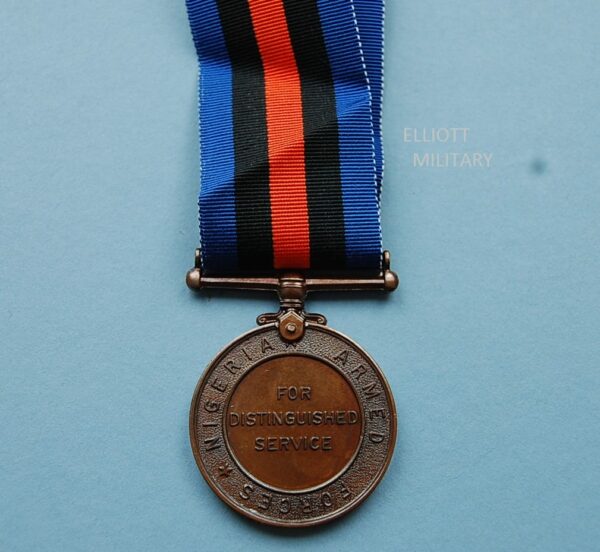 reverse of medal reading Nigeria Armed Forces for distinguished service