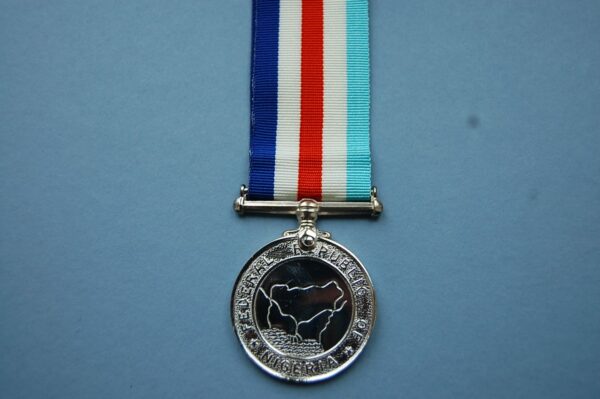 circular medal with map and inscription Federal Republic of Nigeria