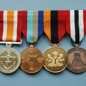 4 Nigerian medals on a mounting brooch