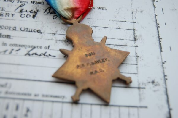 reverse of medal showing naming detail