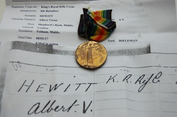 Obverse of medal with papers