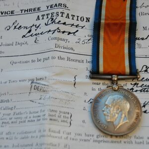 obverse of medal with papers