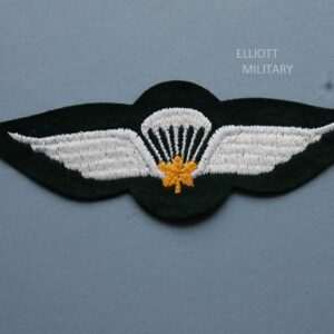obverse of badge