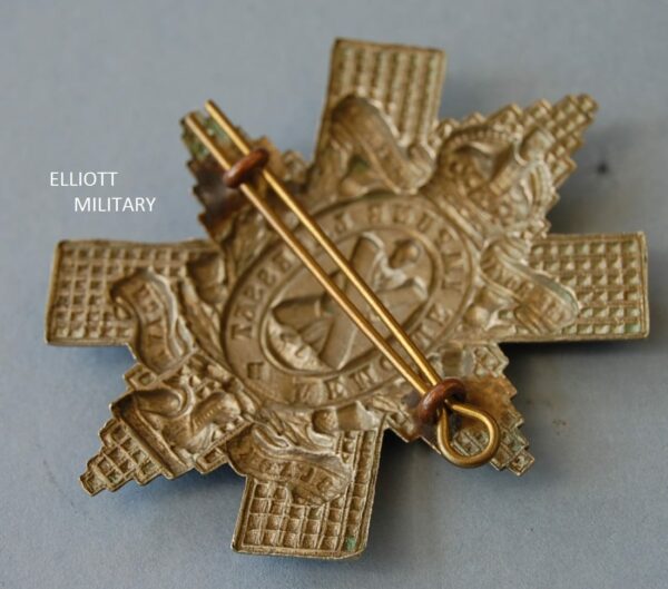 reverse of badge