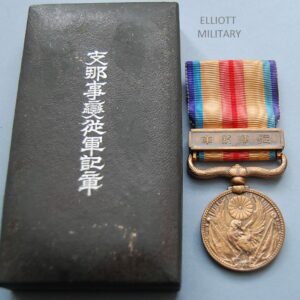 obverse of medal and box