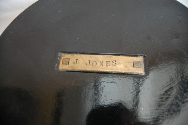 name plate on tin lid